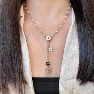 CHANEL Gold and White Floral Necklace